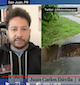 Photo of Juan Carlos Davilla being interviewed on Democracy Now!